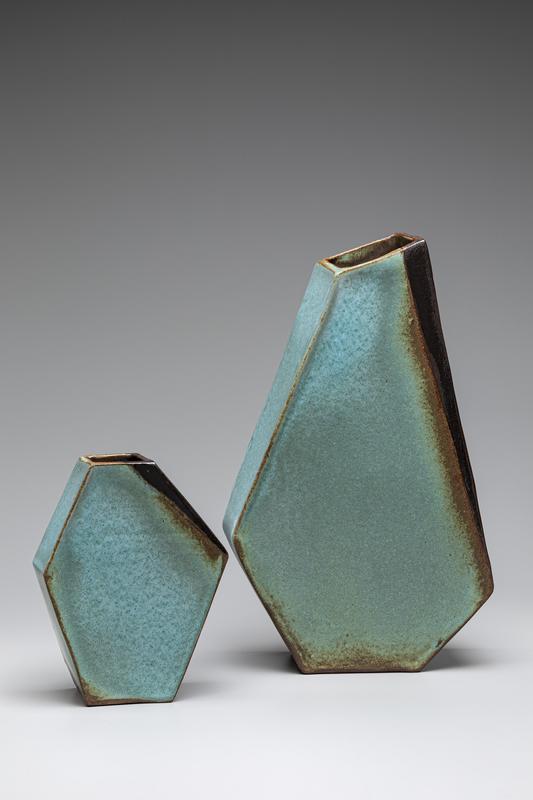 A pair of Ikebana vases, designed to appear off-centered but balanced