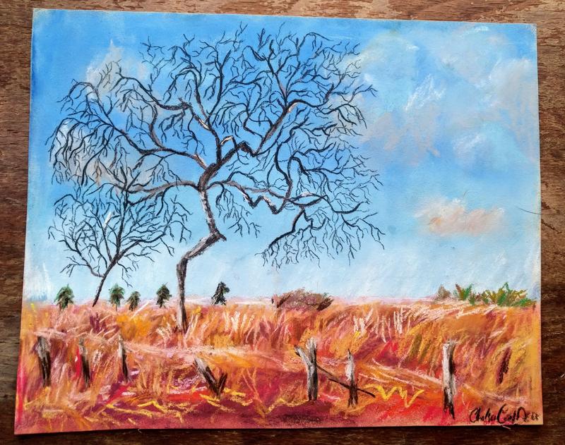 This piece of work is a vibrant expression of the fall season in Minnesota. It has two bare trees with many dark-colored branches within a prairie that has grass expressed in strong red, yellow and brown hues, with highlights of yellow. We know it is falling because there are still hints of green trees in the far distance and on the horizon. The blue sky and light small clouds remind us that fall in Minnesota is one of its most beautiful seasons.