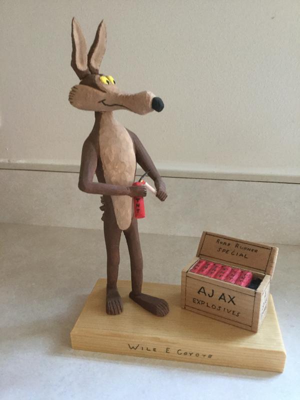 View of carving with subject lighting a stick of explosives in order to capture the illusive Road Runner