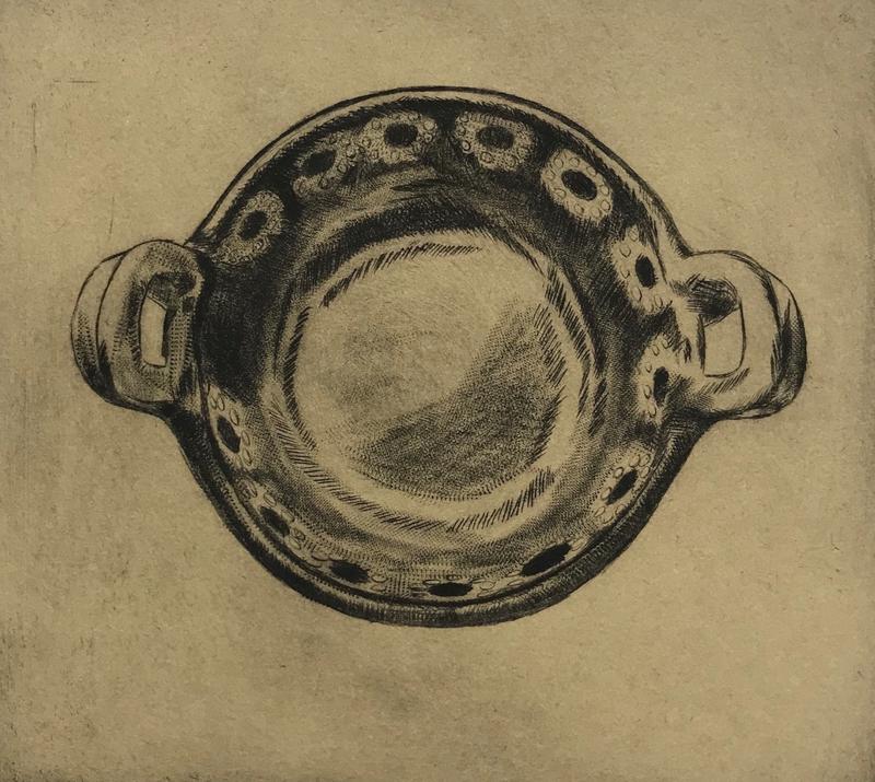 A black drypoint etching on brown paper of a Mexican cazuela, a shallow clay cooking dish similar to a casserole, with a floral motif.