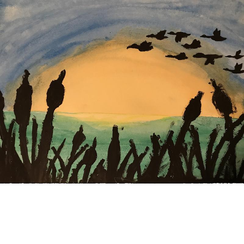 A yellow sunrise with blue skies and black cattails and geese flying in the foreground.