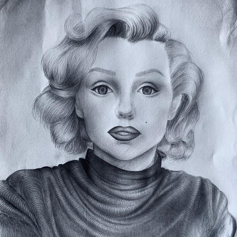 A pencil-drawn portrait of Marilyn Monroe based on a photograph from the 1950's.
